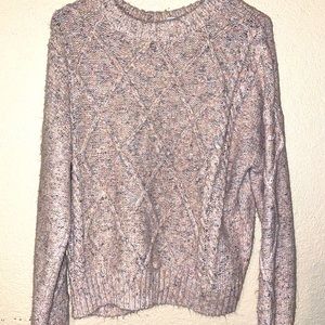 Pink long sleeve sweater.